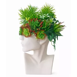 Designerski wazon w kształcie głowy z kompozycją sztucznych sukulentów